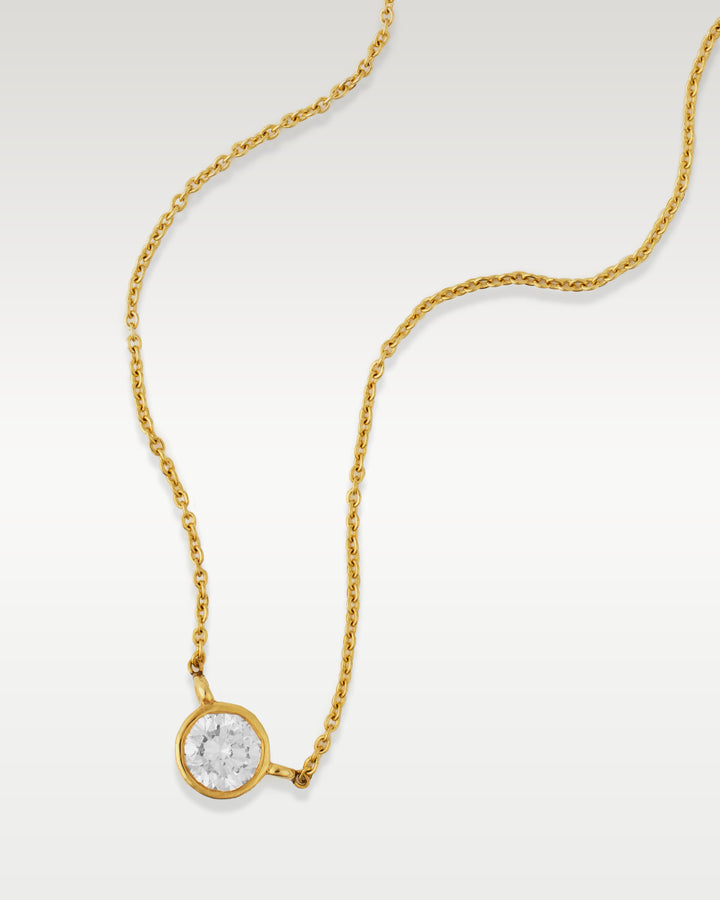 Yellow Gold Bezel Set Diamond Solitaire Pendant Necklace | Bitton Diamonds Dallas