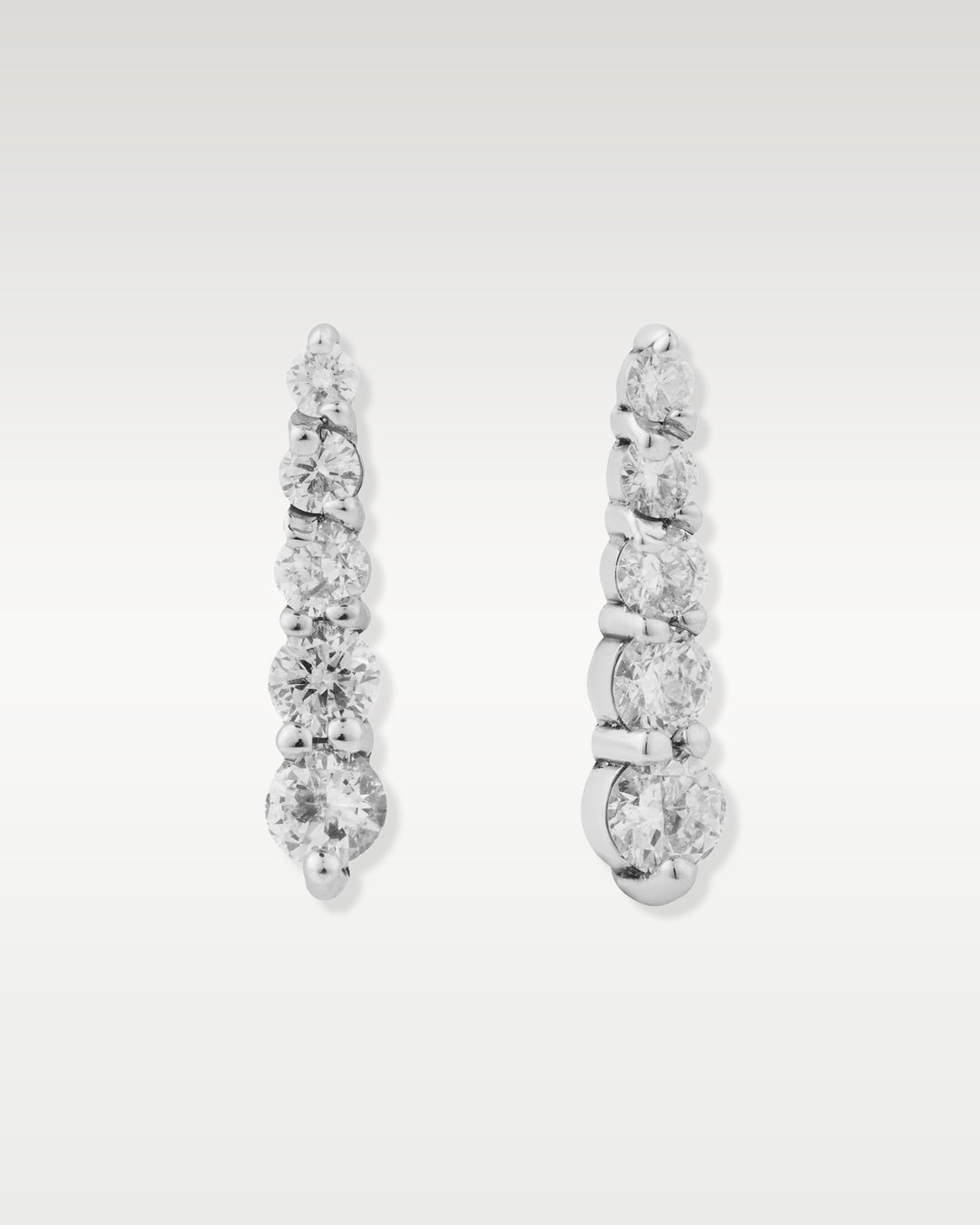 White Gold Graduated Diamond Drop Earrings | Bitton Diamonds Dallas