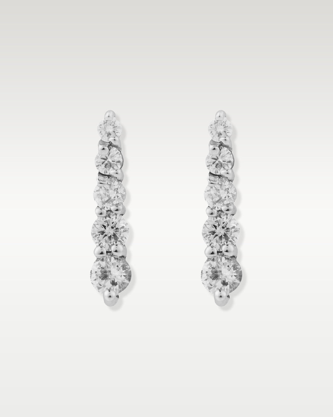 White Gold Graduated Diamond Drop Earrings | Bitton Diamonds Dallas